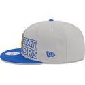 gra-og-bla-snapback-fladskaerm-9fifty-draft-edition-2023-golden-state-warriors-nba-kasket-fra-new-era