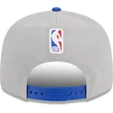 gra-og-bla-snapback-fladskaerm-9fifty-draft-edition-2023-golden-state-warriors-nba-kasket-fra-new-era
