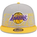 gra-og-gul-snapback-fladskaerm-9fifty-draft-edition-2023-los-angeles-lakers-nba-kasket-fra-new-era