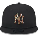 sort-flad-snapback-kasket-med-brunt-logo-9fifty-seasonal-infill-af-new-york-yankees-mlb-fra-new-era