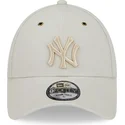 beige-justerbar-buet-kasket-med-beige-logo-9forty-washed-canvas-fra-new-york-yankees-mlb-fra-new-era