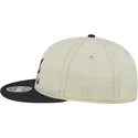 beige-og-marinebla-9fifty-retro-crown-denim-flad-kasket-fra-atlanta-braves-mlb-fra-new-era