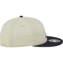 beige-og-marinebla-9fifty-retro-crown-denim-flad-kasket-fra-atlanta-braves-mlb-fra-new-era
