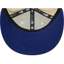 los-angeles-dodgers-mlb-59fifty-team-colour-beige-og-bla-fladskygget-kasket-fra-new-era
