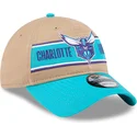 brun-og-bla-justerbar-buet-kasket-9twenty-draft-2024-fra-charlotte-hornets-nba-fra-new-era