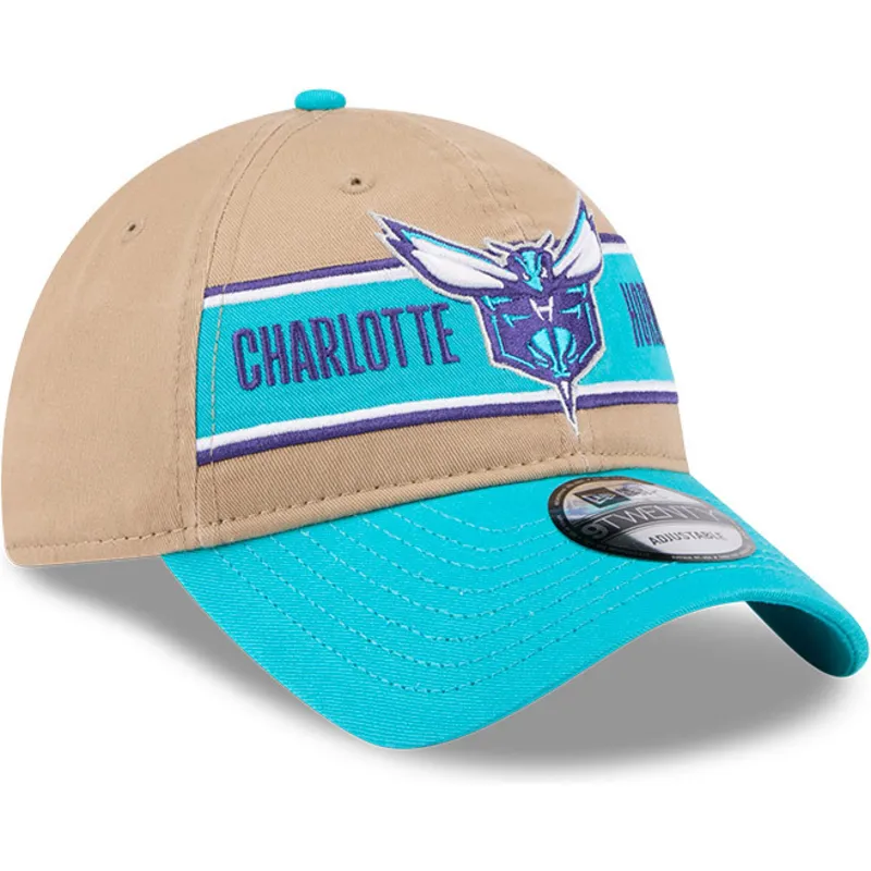 charlotte-hornets-nba-new-era-9twenty-draft-2024-justerbar-brun-og-bla-bojet-skygge-kasket
