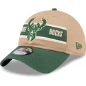 brun-og-gron-justerbar-kurvet-kasket-9twenty-draft-2024-fra-milwaukee-bucks-nba-fra-new-era