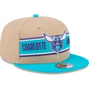 brun-og-bla-flat-cap-snapback-9fifty-draft-2024-fra-charlotte-hornets-nba-fra-new-era