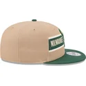 brun-og-gron-snapback-fladskygget-kasket-9fifty-draft-2024-fra-milwaukee-bucks-nba-af-new-era