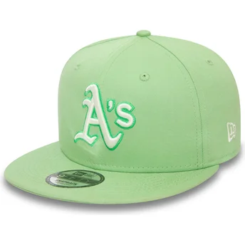 Lys grøn flad snapback kasket 9FIFTY World Series Patch fra Oakland Athletics MLB af New Era