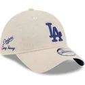 justerbar-beige-buet-kasket-med-blat-logo-9twenty-linen-spring-training-fan-pack-2025-fra-los-angeles-dodgers-mlb-fra-new-era
