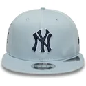 bla-snapback-fladskygget-kasket-med-marineblat-logo-9fifty-original-fit-world-series-fra-new-york-yankees-mlb-af-new-era