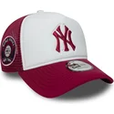 hvid-og-rod-trucker-kasket-med-rodt-e-frame-world-series-logo-fra-new-york-yankees-mlb-fra-new-era