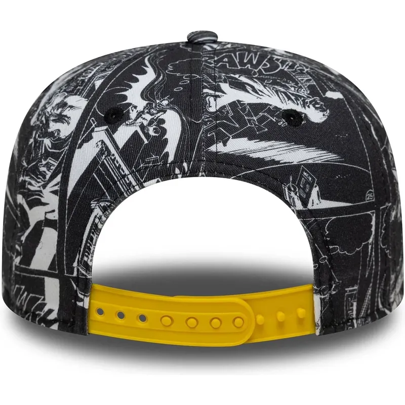 flad-sort-snapback-kasket-til-dreng-9fifty-all-over-print-fra-batman-dc-comics-fra-new-era