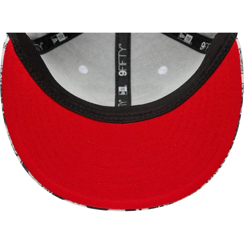 flad-sort-snapback-kasket-til-dreng-9fifty-all-over-print-fra-superman-dc-comics-fra-new-era