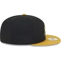 sort-og-gul-justerbar-flat-cap-med-guldlogo-59fifty-day-fra-new-york-yankees-mlb-fra-new-era