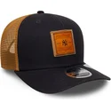 marinebla-og-brun-9seventy-stretch-snap-trucker-cap-med-praeget-logo-fra-new-york-yankees-mlb-fra-new-era