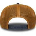 marinebla-og-brun-9seventy-stretch-snap-trucker-cap-med-praeget-logo-fra-new-york-yankees-mlb-fra-new-era