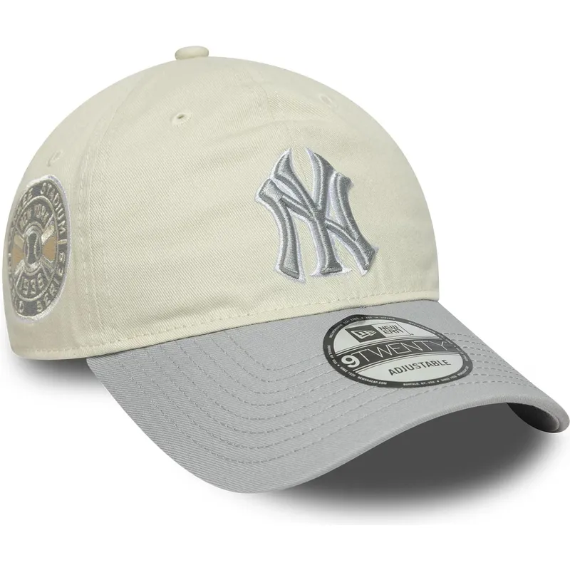 buet-beige-og-gra-justerbar-kasket-til-kvinder-9twenty-world-series-cooperstown-fra-new-york-yankees-mlb-fra-new-era