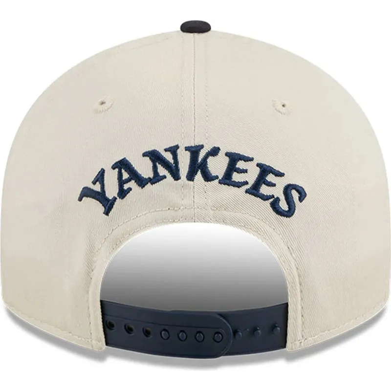 buet-beige-og-marinebla-snapback-kasket-9fifty-retro-crown-scatter-fra-new-york-yankees-mlb-fra-new-era buet-beige-og-marinebla-snapback-kasket-9fifty-retro-crown-scatter-fra-new-york-yankees-mlb-fra-new-era