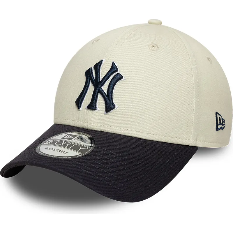 buet-beige-og-marinebla-justerbar-kasket-med-marinebla-logo-9forty-world-series-fra-new-york-yankees-mlb-fra-new-era