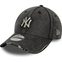 sort-justerbar-kurvet-kasket-9forty-acid-wash-denim-fra-new-york-yankees-mlb-fra-new-era