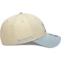 buet-kasket-beige-og-bla-snapback-med-blat-logo-9forty-m-crown-side-script-fra-new-york-yankees-mlb-fra-new-era
