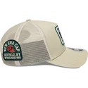 beige-trucker-kasket-9forty-m-crown-a-frame-multi-patch-fra-new-era