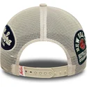 beige-trucker-kasket-9forty-m-crown-a-frame-multi-patch-fra-new-era