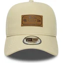 beige-trucker-kasket-a-frame-denim-leather-patch-fra-new-era