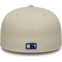 beige-fitted-flad-kasket-med-marineblat-logo-59fifty-city-icon-fra-new-york-yankees-fra-new-era