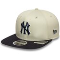 beige-flad-snapback-kasket-med-marineblat-logo-9fifty-original-fit-world-series-fra-new-york-yankees-mlb-fra-new-era