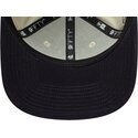 beige-flad-snapback-kasket-med-marineblat-logo-9fifty-original-fit-world-series-fra-new-york-yankees-mlb-fra-new-era